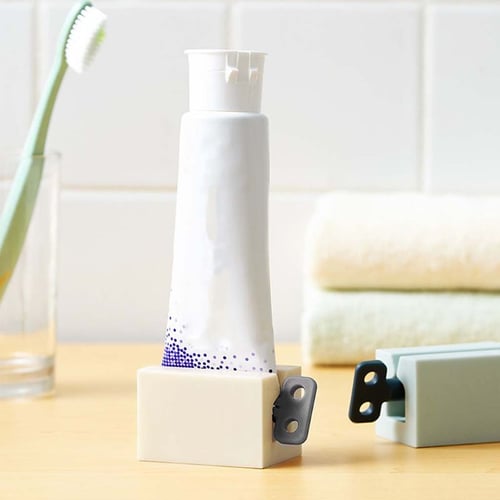 Hot Plastic Tube Toothpaste Dispenser Rolling Holder Squeezer Sucker Suction Cup 
