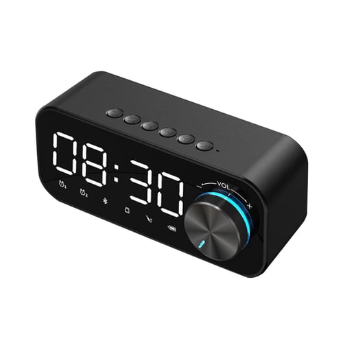 Wireless speaker outlet alarm clock
