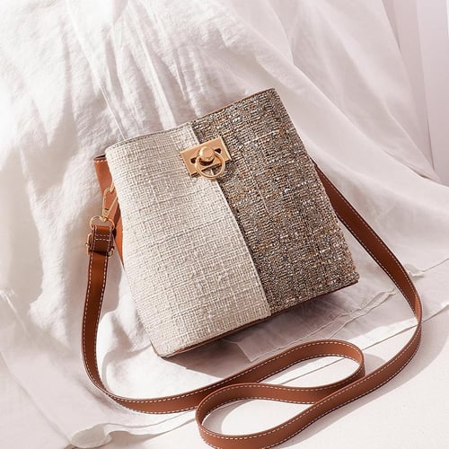 Circular buckle crossbody bag top