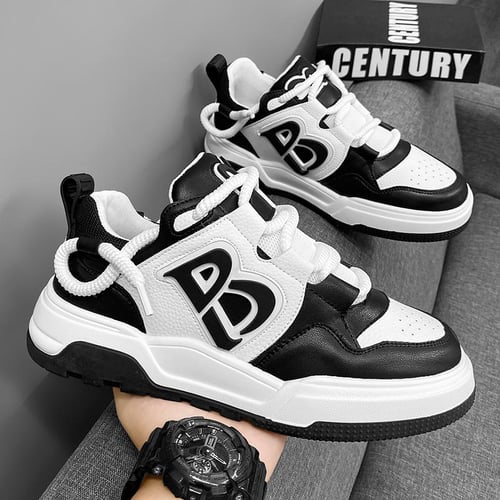 Trendy black tennis shoes on sale